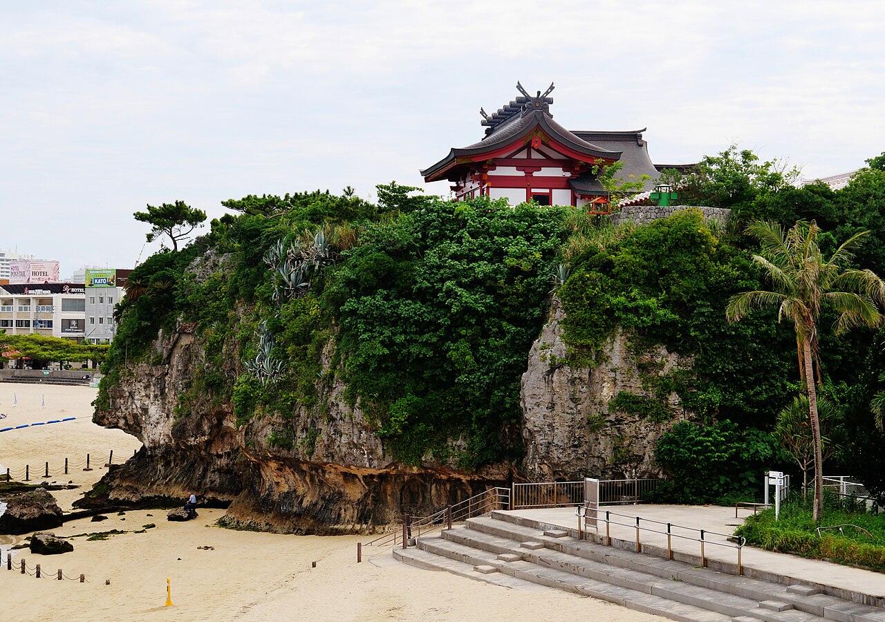 Naminoue Beach with the shrine atop the cliff